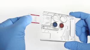 CBC test kit sampler inserted into cartridge