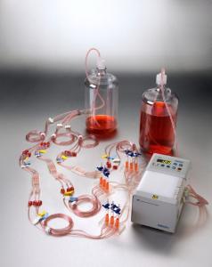 Complete 3-Channel Flow Cell Assembly with culture media and waste bottles, peristaltic pump and bubble traps.