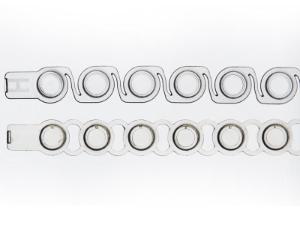Strip of 8 flat optical caps crystal clear (top) and standard cap strip (bottom), comparison