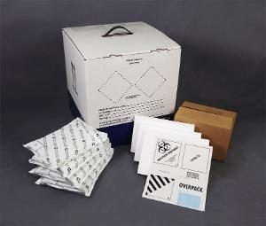 Sample transport shipper, with compliant labels, payload box, cold packs and spacers