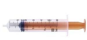 Syringe with detachable needle, amber color